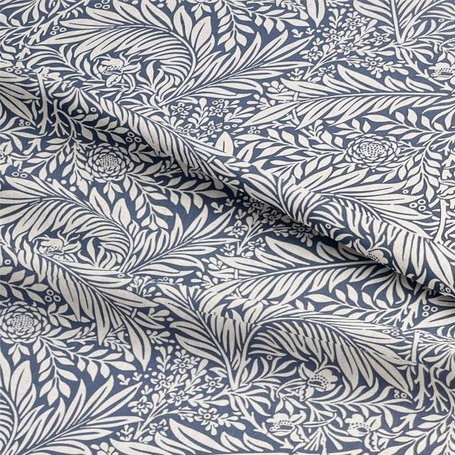 Close-up image of high-quality Duston Fabric in a beautiful shade of blue, perfect for upholstery and home decor projects