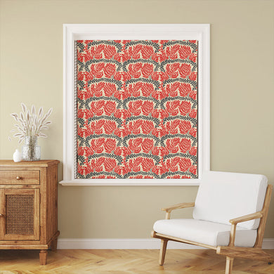 Eastbury Linen Curtain Fabric in Red hanging in a well-lit room, creating a cozy atmosphere