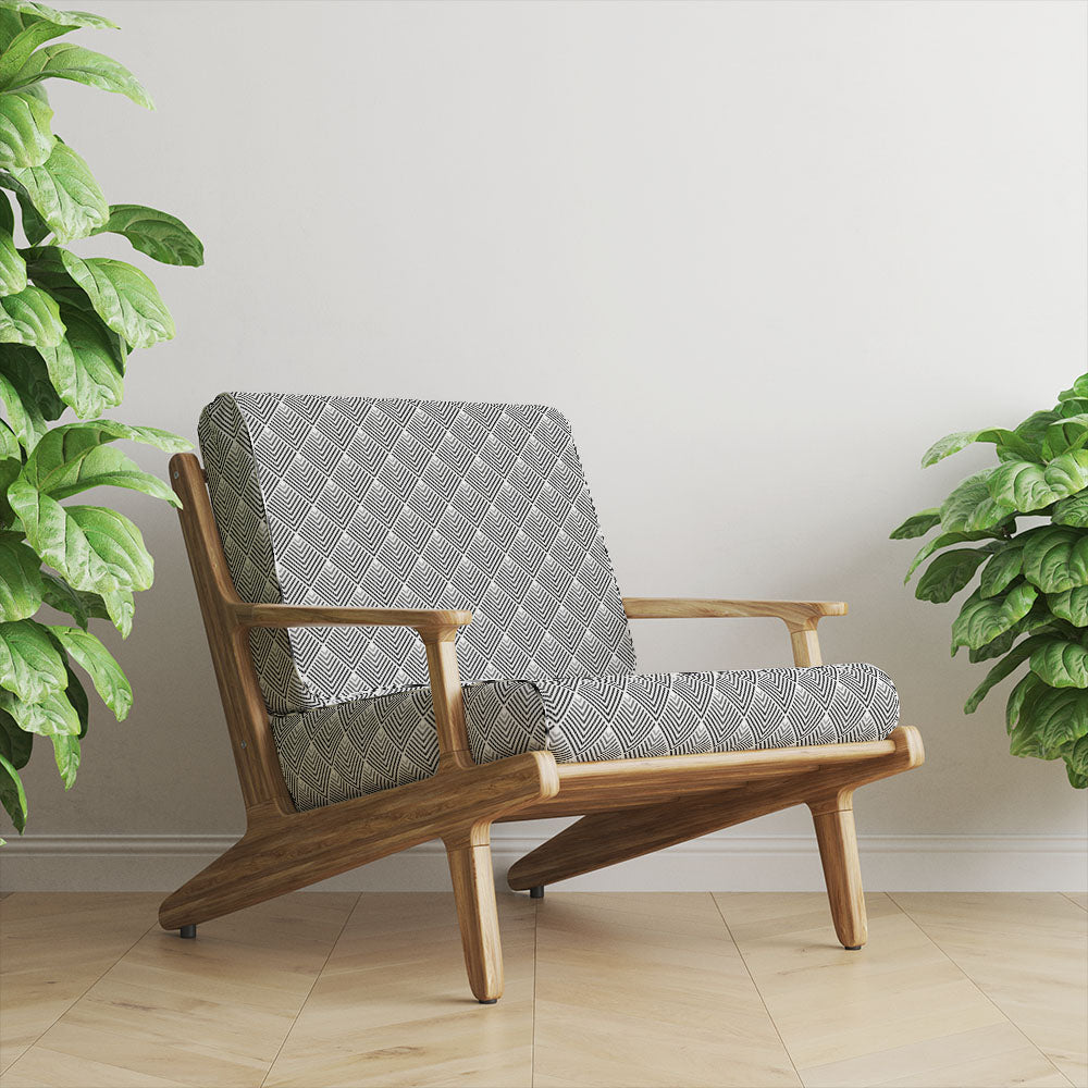 Black geometric velvet upholstery fabric upholstered on modern accent chair