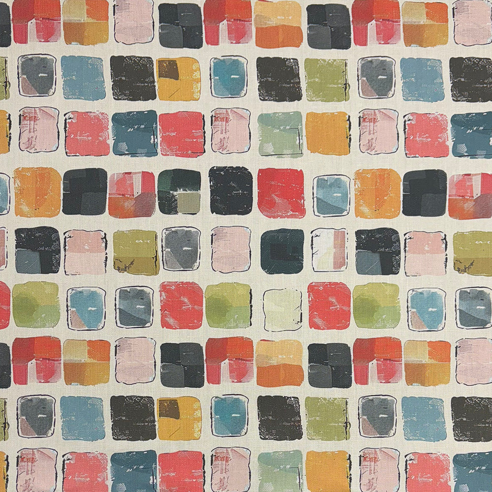 Close-up of Feltham multi cotton fabric with vibrant geometric blocks.