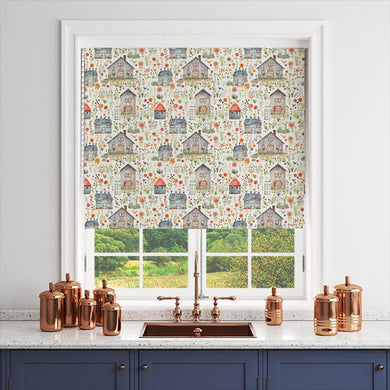 Folk House Green fabric as a Roman blind in a white-framed kitchen window