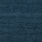 Fontwell Petrol deep-toned fire-retardant upholstery fabric for soft furnishings.