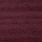 Fontwell Plum deep-toned fire-resistant upholstery fabric with a woven texture.