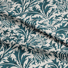 Close-up of the rich and textured Fouet Linen Curtain Fabric in Deep Teal