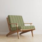 Foxwolde Striped Upholstery Fabric in Lemongrass – pale green stripe fabric upholstered on chair