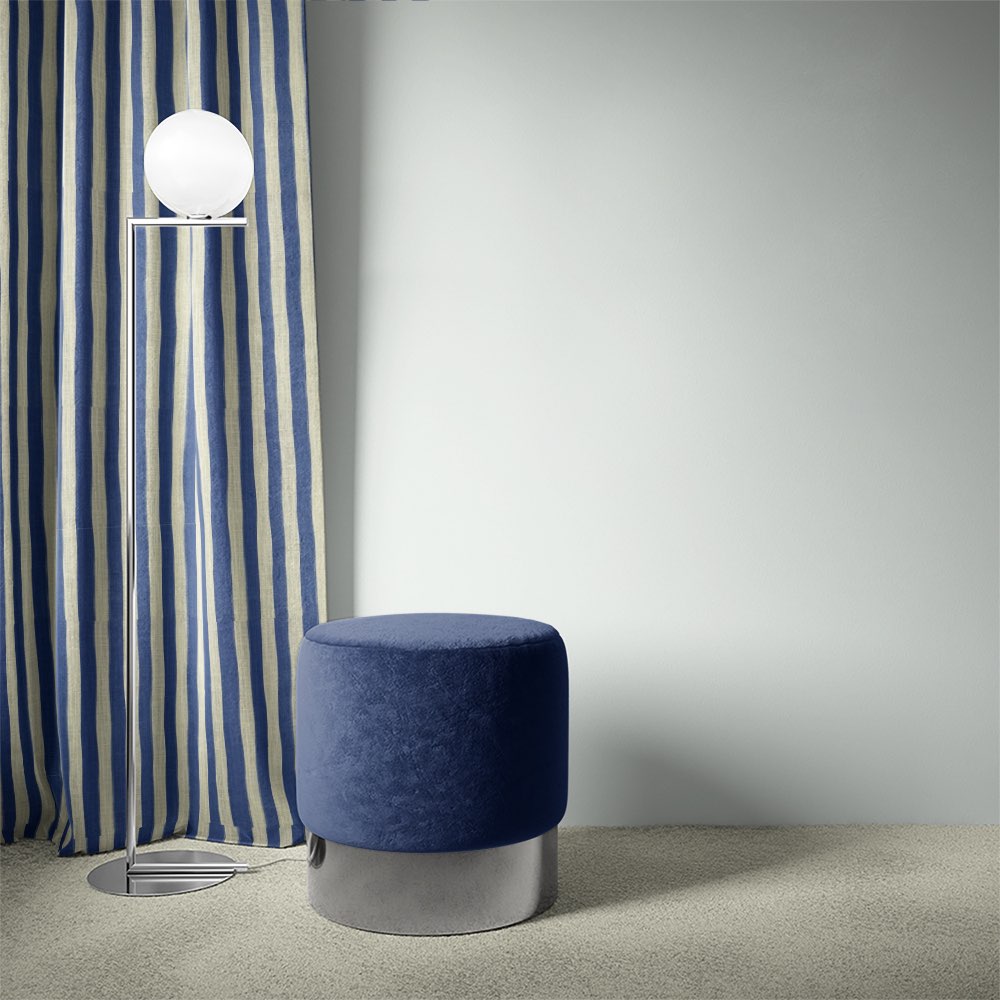 Fremont Blue striped curtain fabric styled as curtains with rich blue and ivory tones