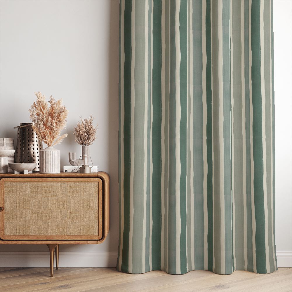 Fresno Stripe Green linen curtain fabric made into curtains with tonal sage green and ivory stripes in a calm, neutral living space