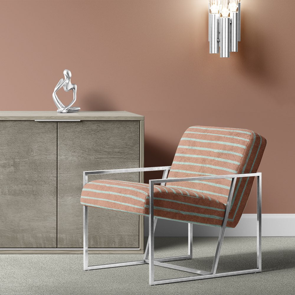Garonne peach striped fabric for creating stylish and comfortable upholstered furniture pieces.