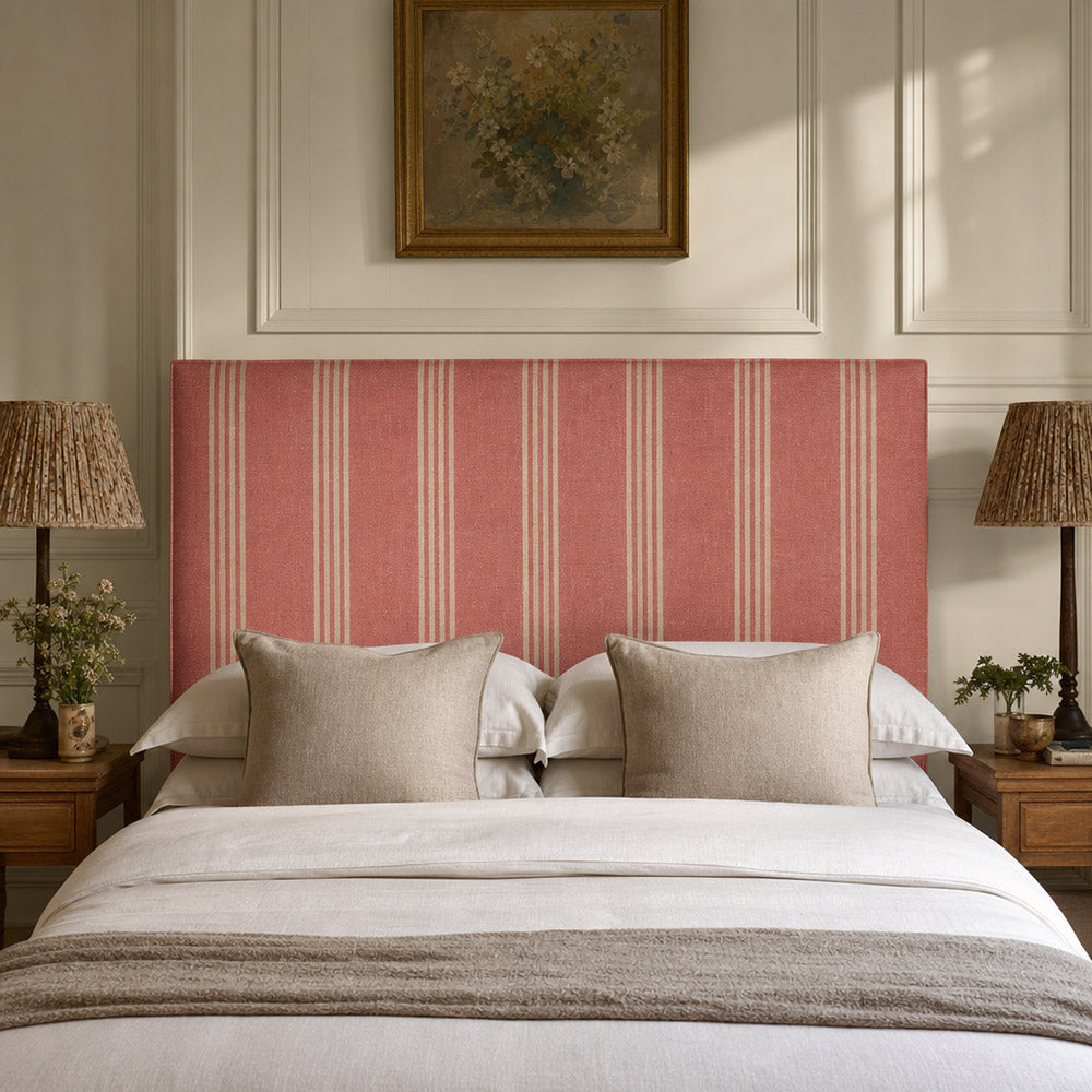 Hampton Red striped upholstery fabric on a headboard, durable heavy duty fabric for bold bedroom upholstery and interiors