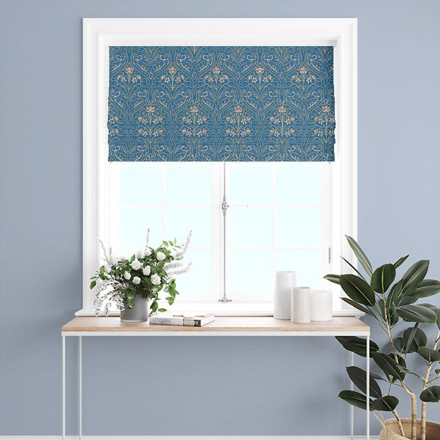 Hathaway Linen Curtain Fabric - Blue draping elegantly in a living room setting