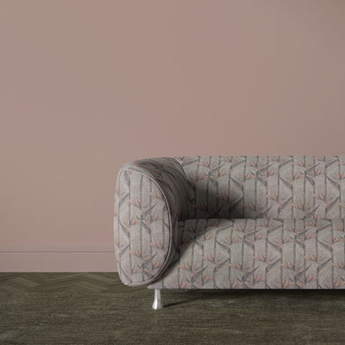Holywell Leaf Blush fabric upholstered on contemporary sofa with leaf design
