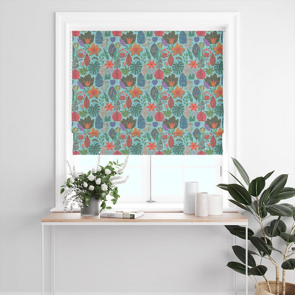 Harper floral curtain fabric used on a Roman blind – multicoloured leaves and flowers on blue cotton fabric