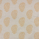 Kaveri Paisley Ochre upholstery fabric swatch, featuring warm golden tones in a detailed paisley print