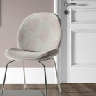 Kaveri Paisley Pink upholstery fabric used on a chair, showcasing the intricate pattern and comfortable texture