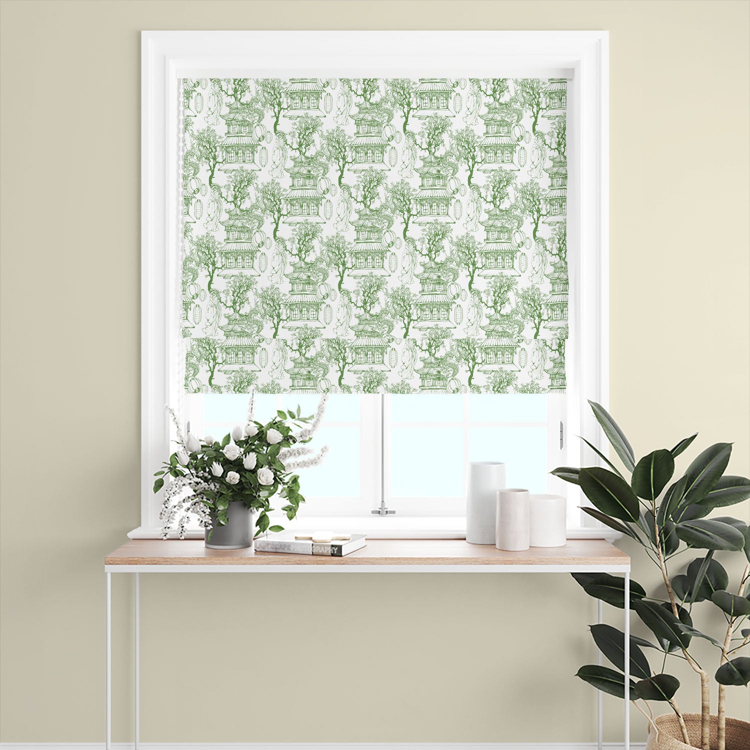 green japanese curtain fabric roman blind displaying botanical toile pattern with trees and architectural elements in soft natural tones