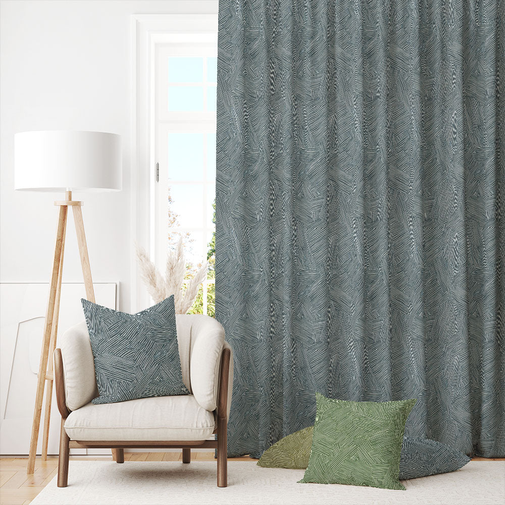 Laguna Denim curtain fabric styled as full-length curtains in a modern living room