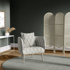 Lambourne Fennel leaf upholstery fabric used on a modern upholstered chair