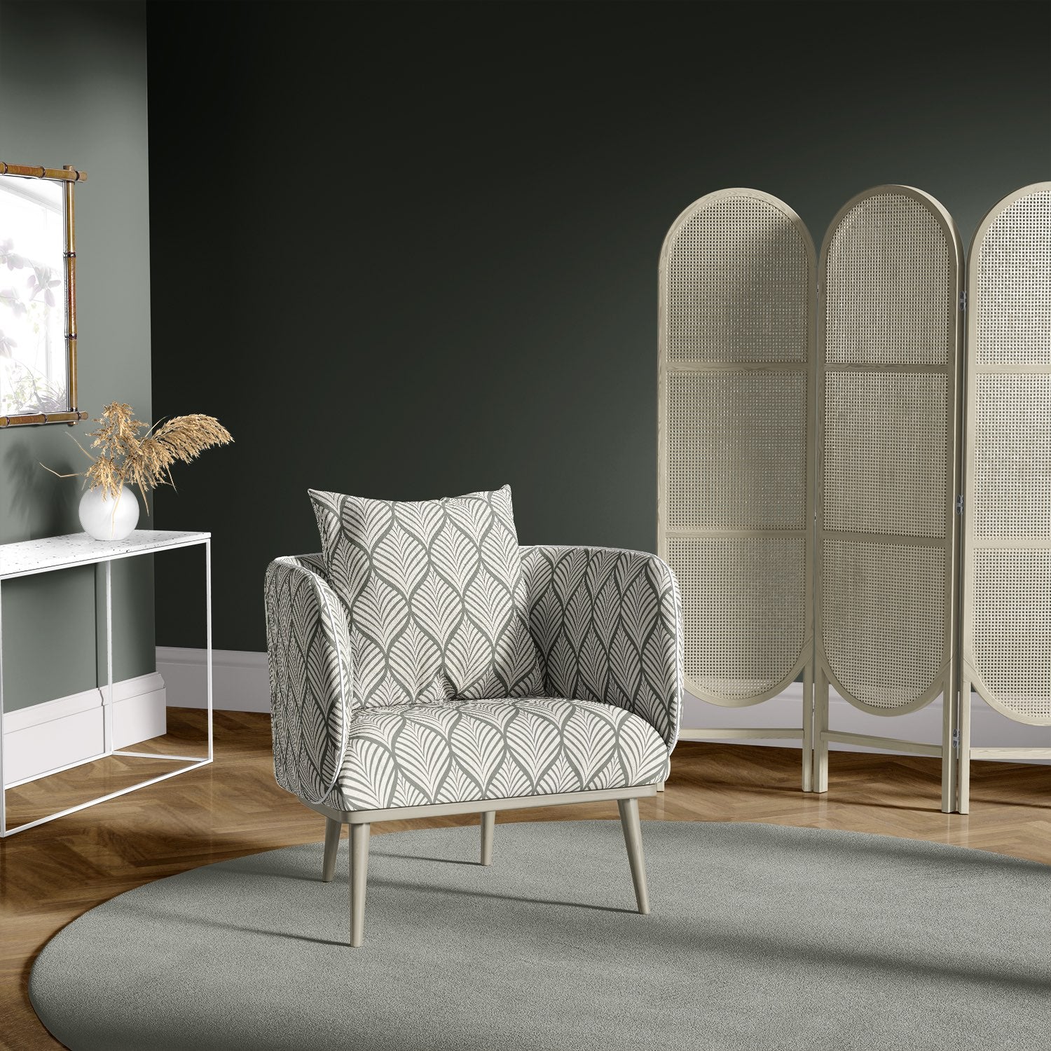 Lambourne Fennel leaf upholstery fabric used on a modern upholstered chair