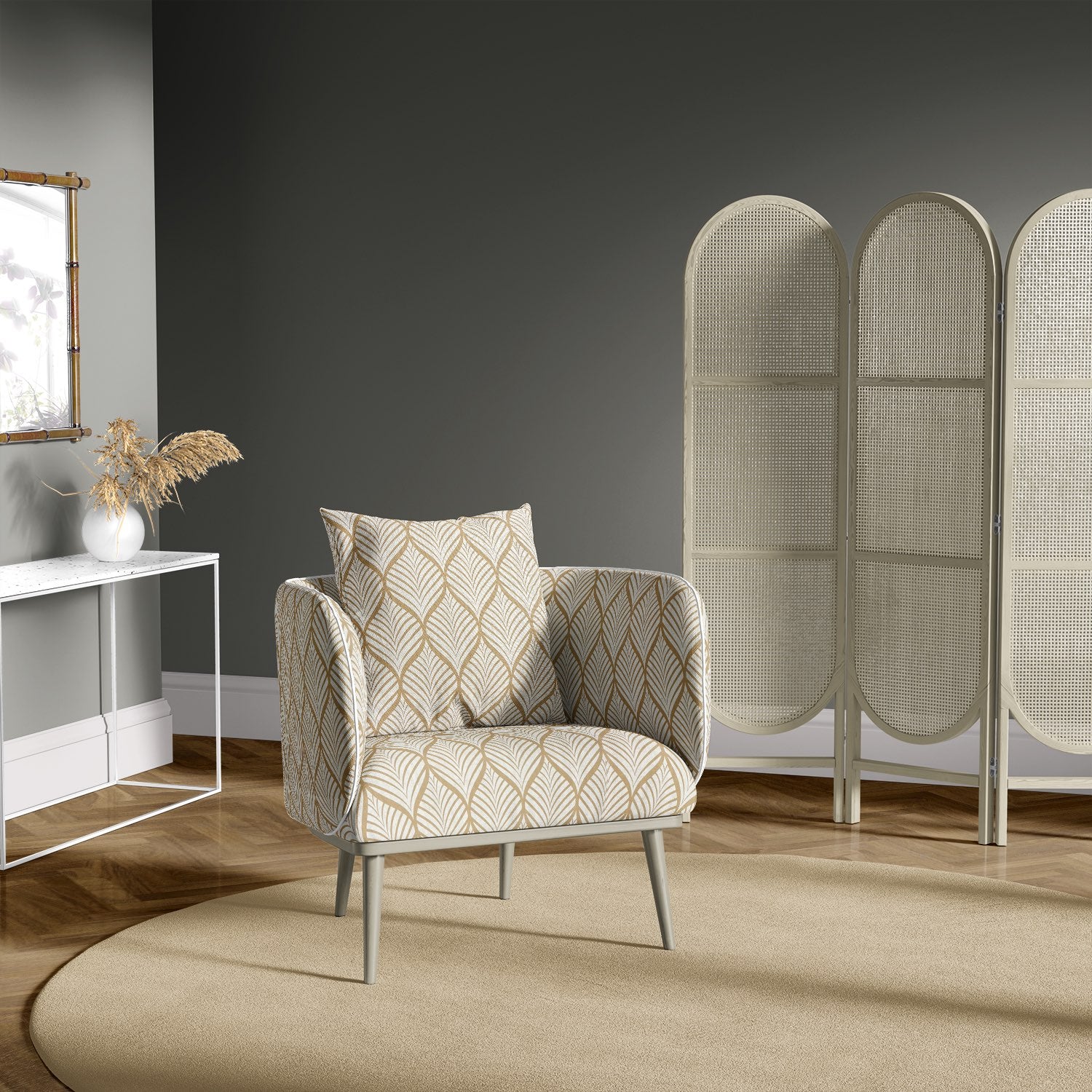 Lambourne Natural leaf pattern upholstery fabric on a cushioned accent chair