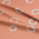 Peach polka dot curtain fabric – a fresh and lively spotted fabric for elegant window treatments.