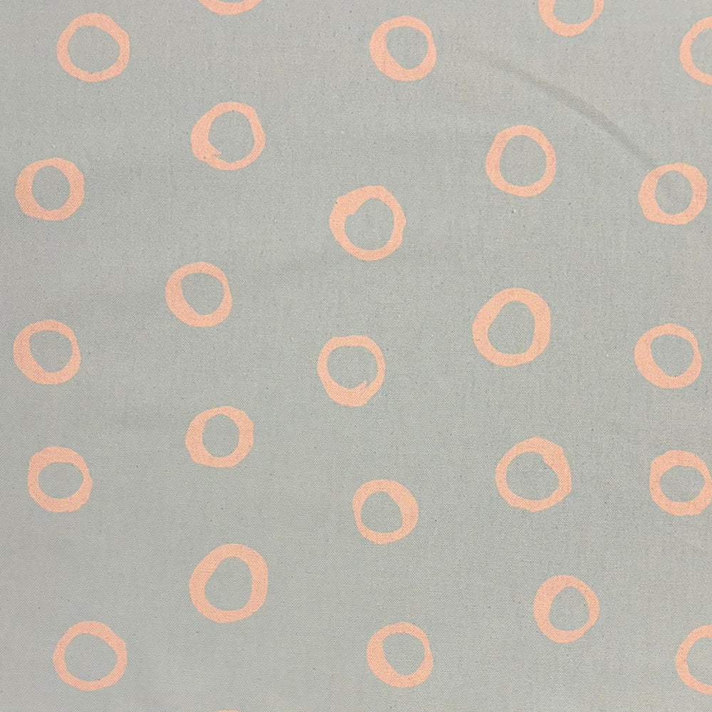 Limentra Sky Spotted Curtain Fabric – a light blue polka dot fabric for bright and airy interiors.