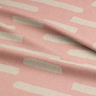 Blush pink Liri fabric for curtains, combining modern style with a warm, inviting hue.