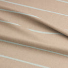 Close-up of Loire natural striped upholstery fabric, emphasizing its high-quality texture and refined stripe pattern.