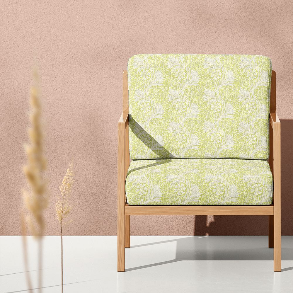 Ochre Marigold fire retardant velvet upholstery fabric shown on a statement chair