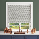 Marlow leaf pattern in Fennel on white background styled as a roller blind in a kitchen setting.