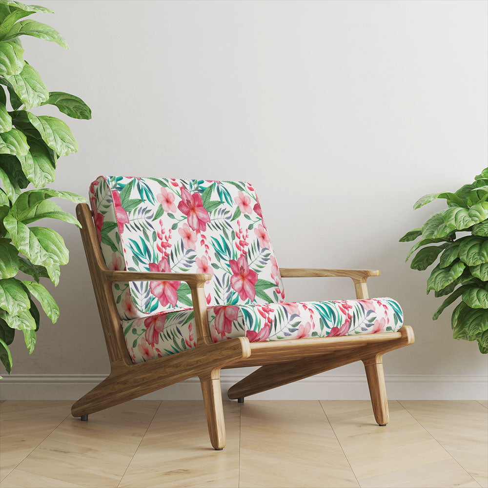 Maylea Crib 5 floral velvet shown on an upholstered chair with red and pink botanical pattern