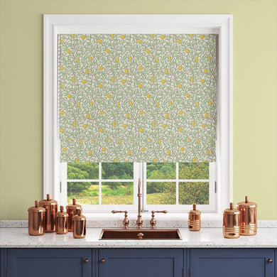 Messina linen curtain fabric in a roman blind with lemon tree pattern – styled in kitchen setting