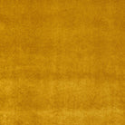 Newbury Ochre Fire Retardant Velvet Upholstery Fabric in a vibrant gold shade
