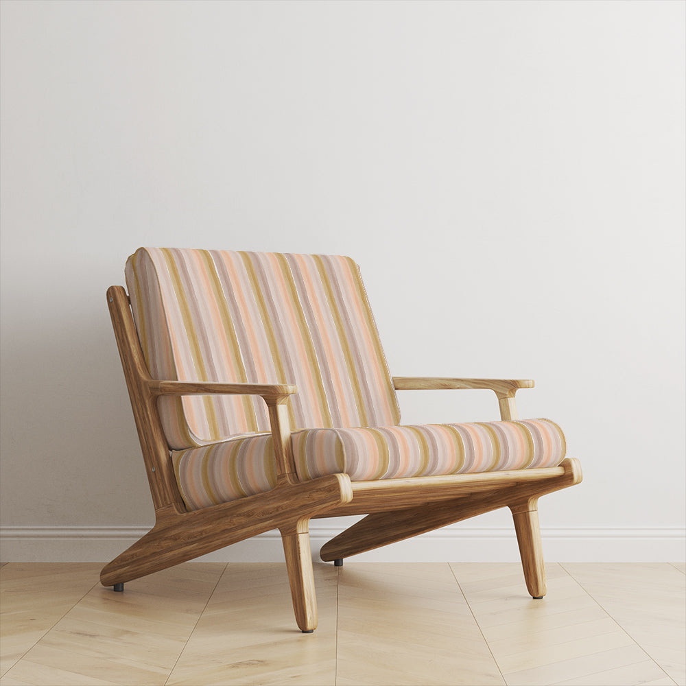 Ohio Stripe Dusky Pink Velvet Upholstery Fabric room set on wooden lounge chair with pastel striped velvet cushions