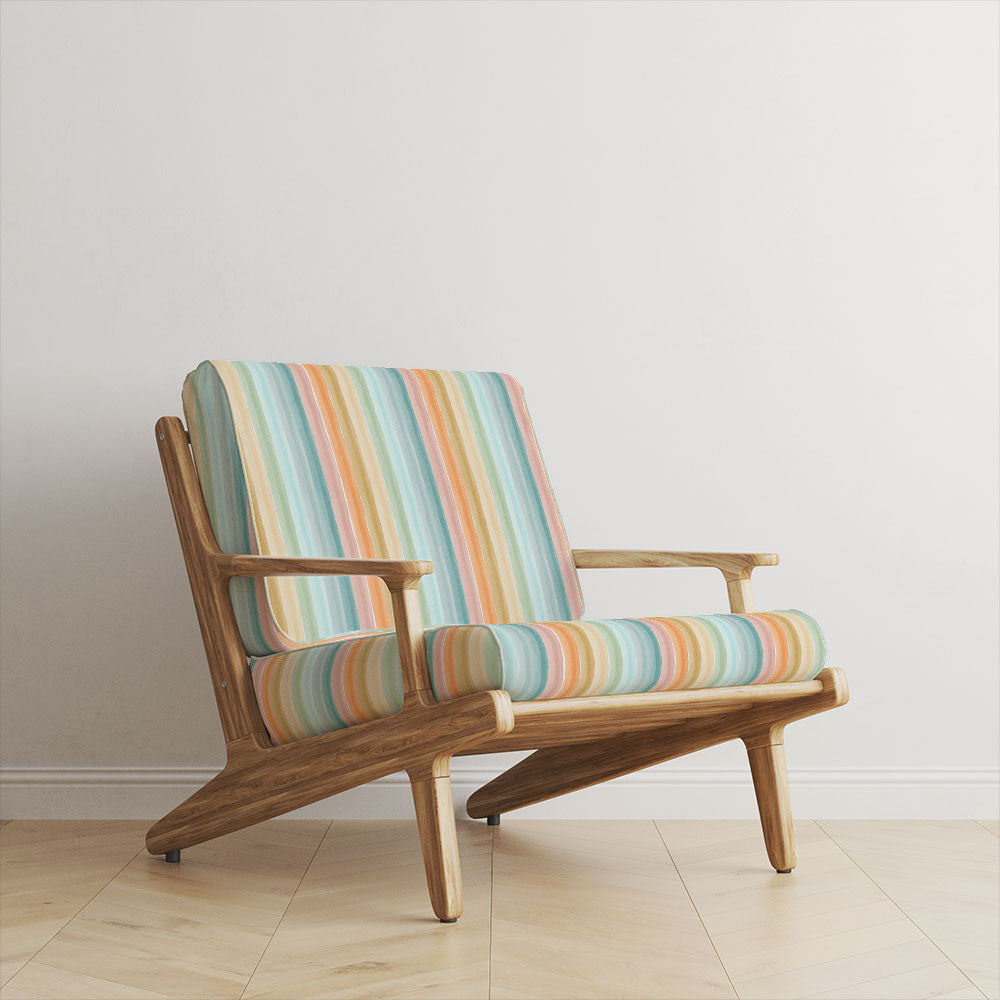 Ohio Stripe Multi Velvet Upholstery Fabric room set showing multicoloured striped velvet on contemporary wooden sofa