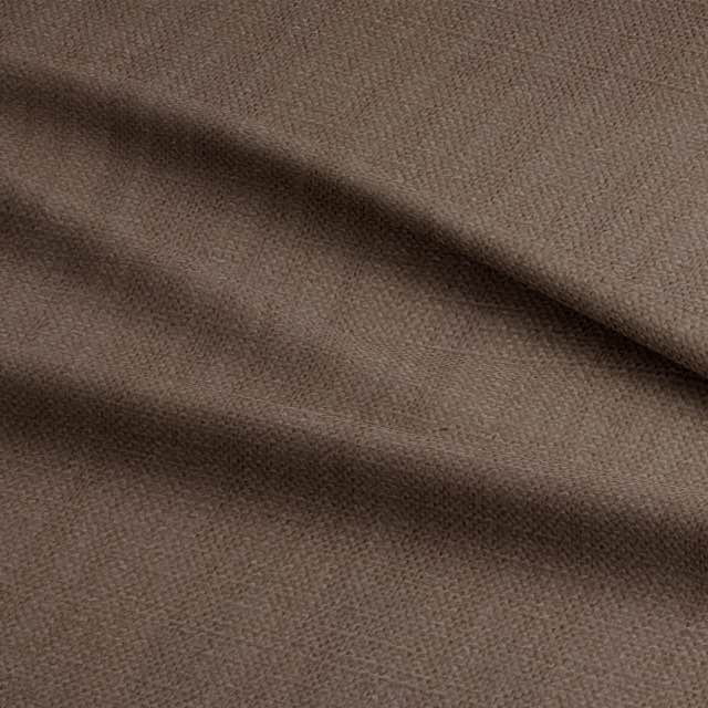 Close-up image of Dion Plain Cotton Fabric in a natural, textured gray color, perfect for upholstery and home decor projects