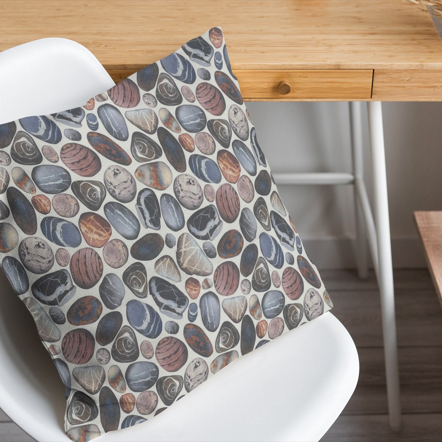 Pebbles Patterned Cushion in Slate Grey Cotton Fabric on Modern White Chair