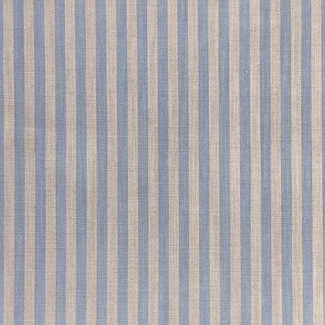 A close-up image of a durable and stylish pencil stripe upholstery fabric suitable for home decor and furniture