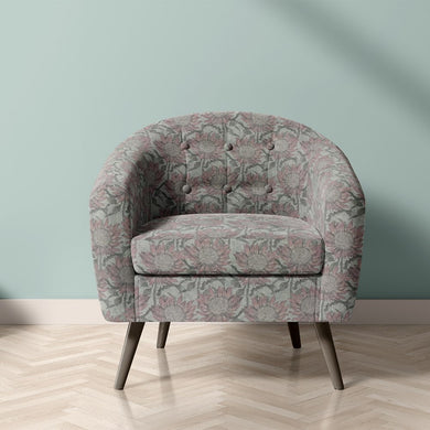 Penrose Floral Duck Egg upholstery fabric on armchair with blue-toned floral pattern