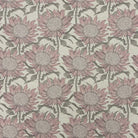Close up of Penrose Floral Natural upholstery fabric with pink floral design