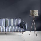 Blue striped upholstery fabric on modern sofa with cream vertical lines