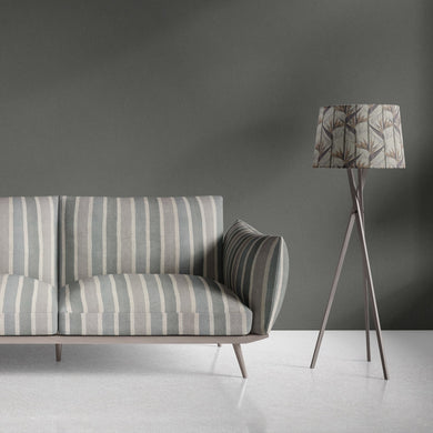 Sage green striped upholstery fabric used on contemporary sofa