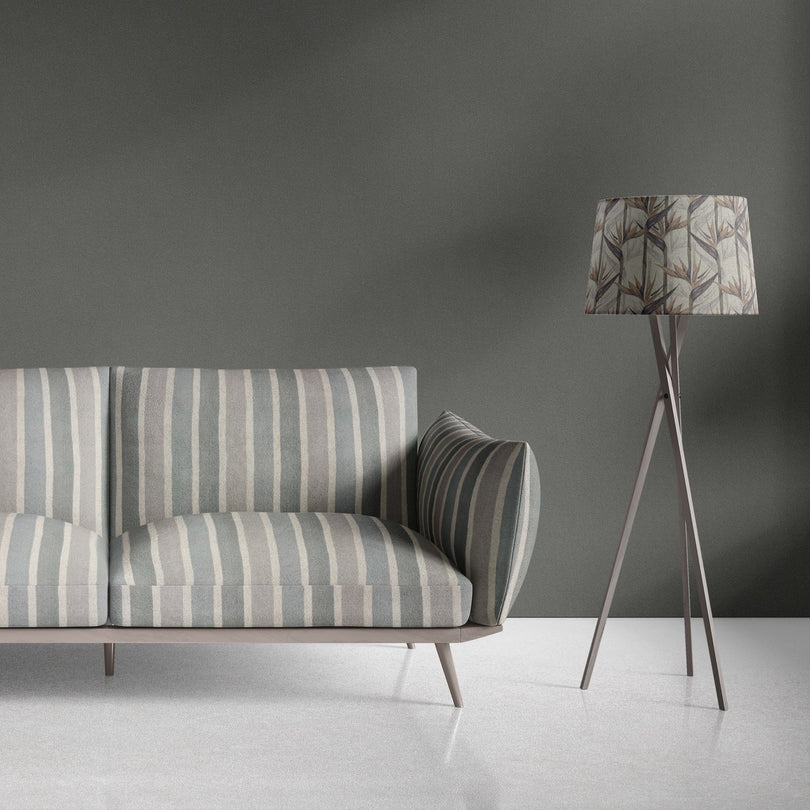 Sage green striped upholstery fabric used on contemporary sofa