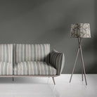 Sage green striped upholstery fabric used on contemporary sofa