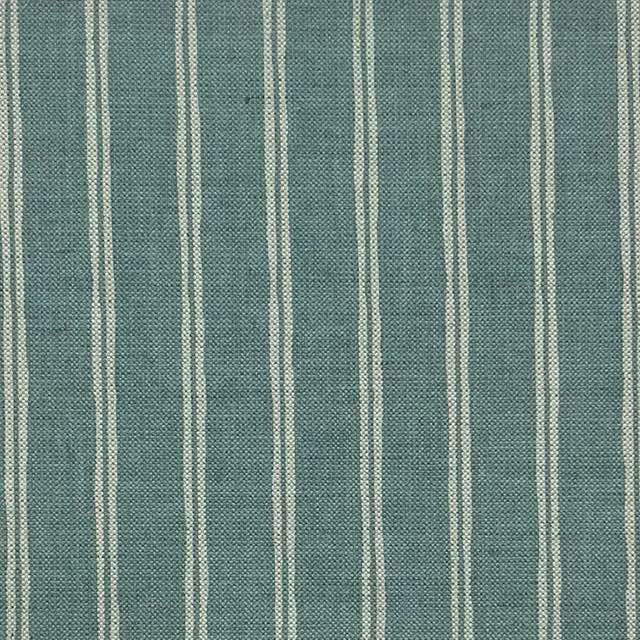 Striped blue and white Rowley Ticking Upholstery Fabric, perfect for home decor projects