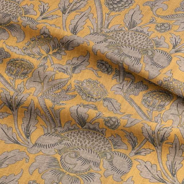 Luxurious Ruskin Curtain Fabric in rich burgundy with golden accents