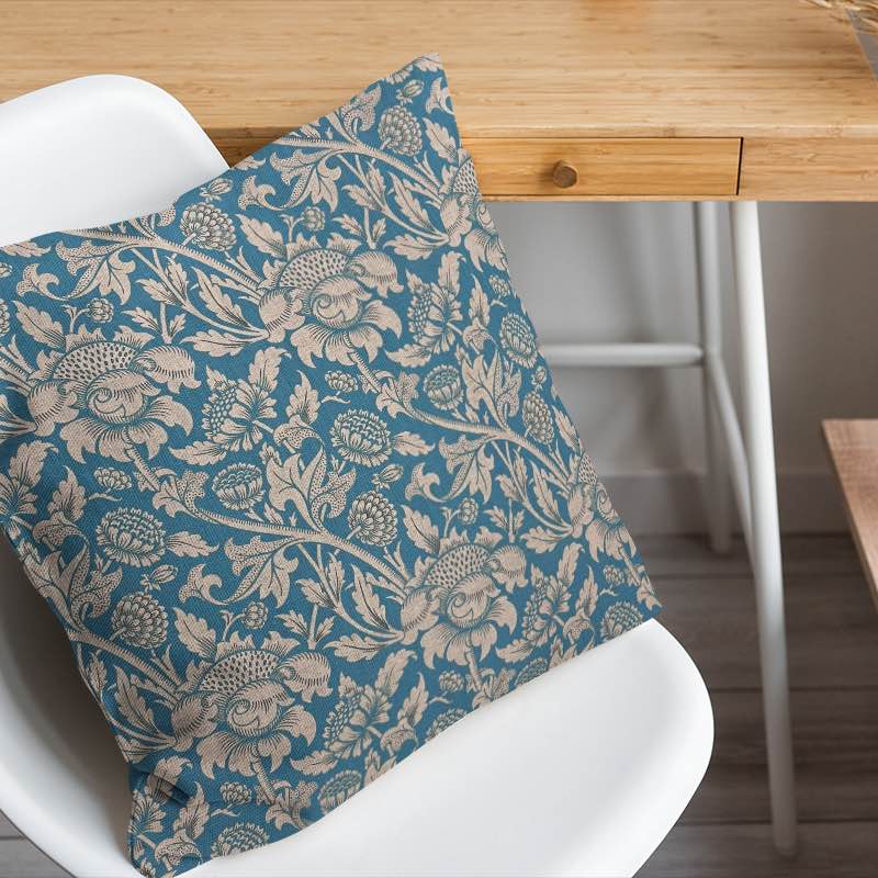 Ruskin Upholstery Fabric in a luxurious deep blue color with a subtle textured design, perfect for adding sophistication and style to any furniture piece