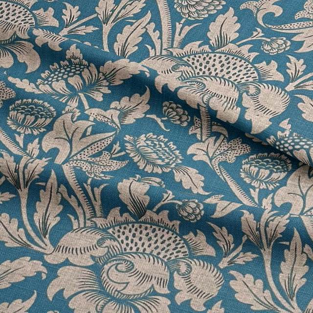 Timeless Ruskin Curtain Fabric in a timeless pearl white with ornate scrollwork