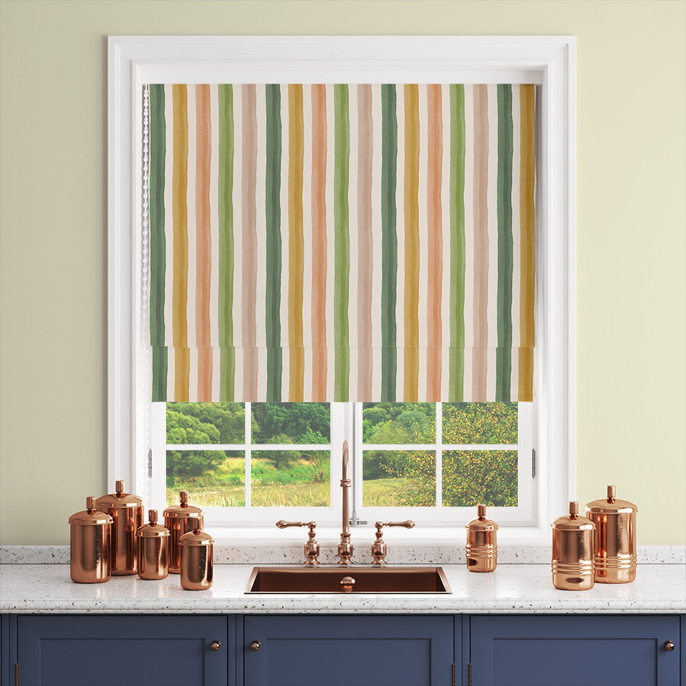 Salem Stripe Meadow fabric shown as a green Roman blind in a relaxed country room