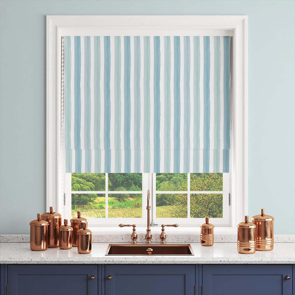 Salem Stripe Sky Roman blind using soft blue striped fabric for an airy window treatment