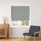 Sherwood Leaf Navy velvet fabric in curtain form, highlighting rich blue tones and leaf detailing